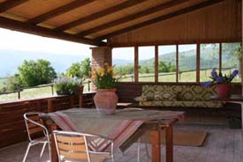 veranda van het vakantiehuis Italie uitgerust als living