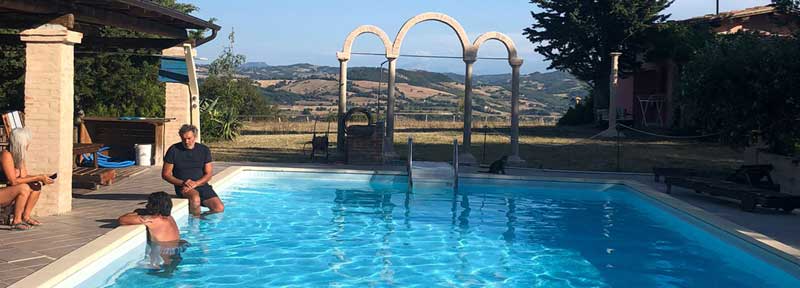combines pool and wine tasting in Marche Italy
