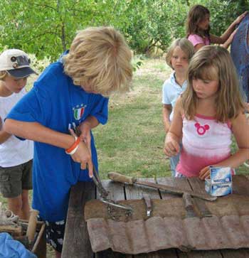 pulling out the pins from the horse-shoes